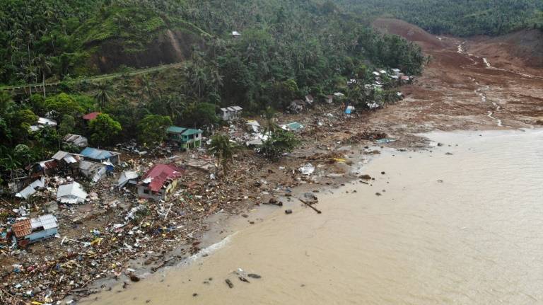 新闻-热带风暴重创菲律宾 增至148死